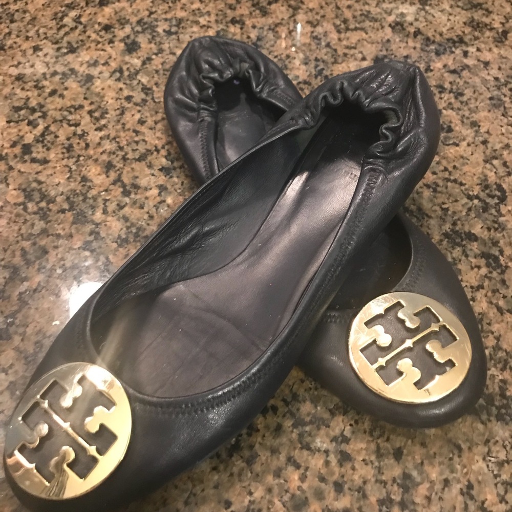 Black Tory Burch flats.